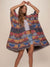 Woman wearing Dire Wolf Fabric Poncho, front view 2