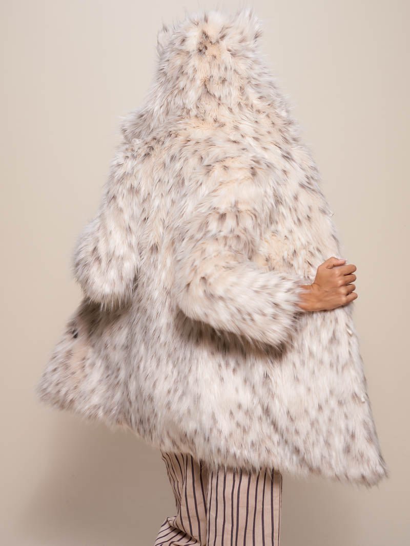 Woman wearing Classic Baby Snow Leopard Faux Fur Coat, back view 1