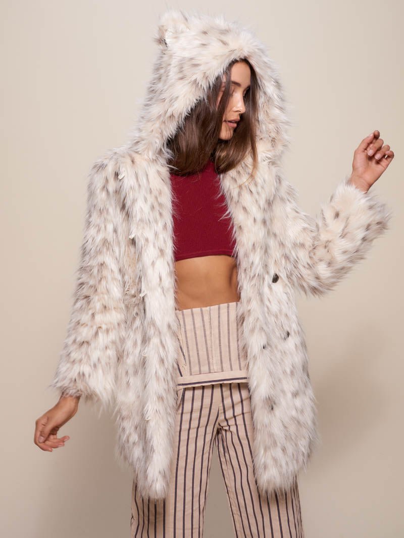 Woman wearing Classic Baby Snow Leopard Faux Fur Coat, front view