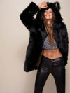 Woman wearing Collector Edition Black Wolf Faux Fur Coat, front view 2