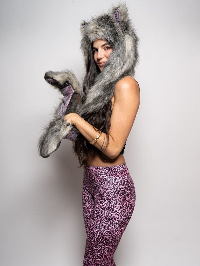 Woman wearing faux fur Collector Edition Eurasian Wolf SpiritHood, side view 1