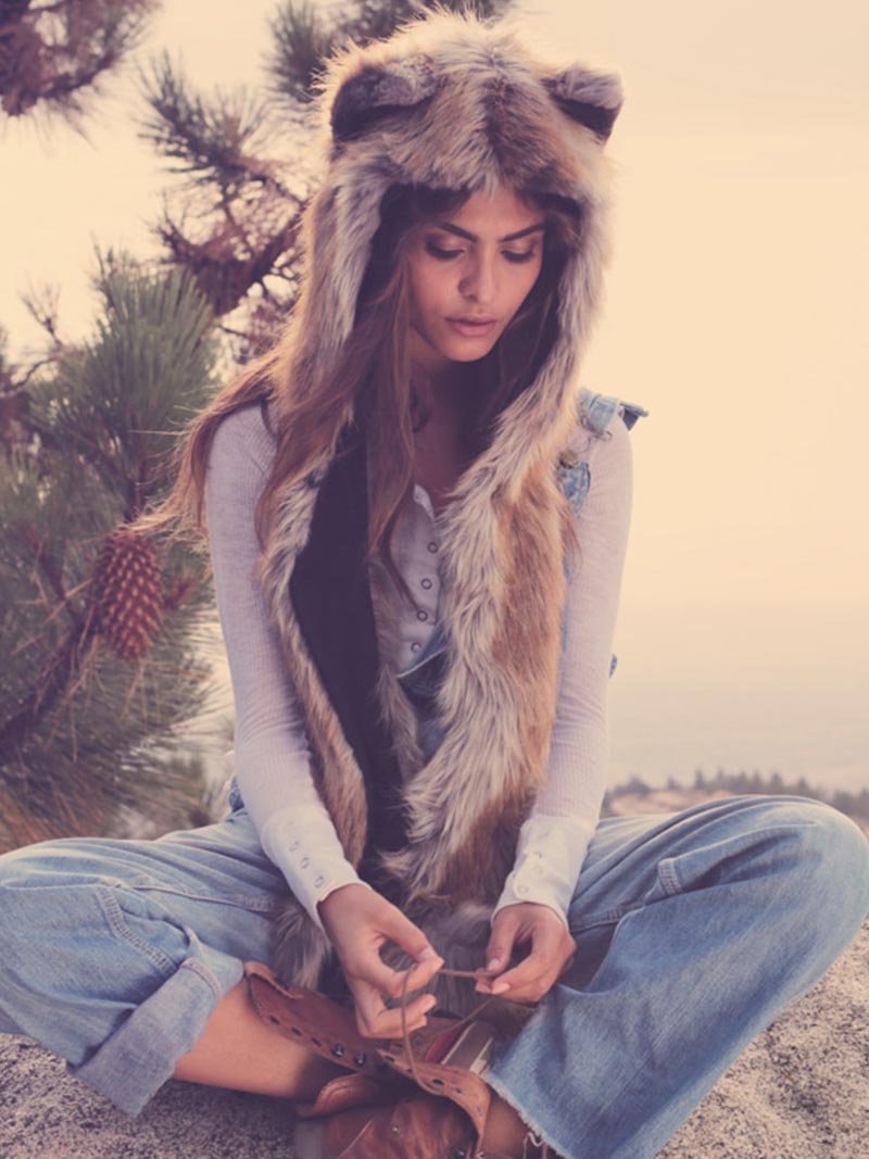 Woman Wearing Red Fox Faux Fur Hood with Hands in Pawkets