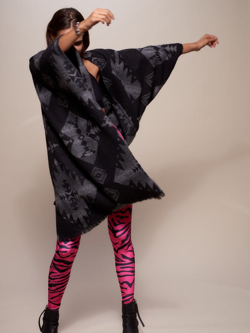 Woman wearing Night Fox Fabric Poncho, side view 4