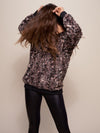 Woman wearing Bobcat Brown Luxe Sweater, front view