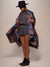 Woman wearing Dire Wolf Fabric Poncho, side view 2