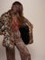 Exterior and Interior View of Leopard Collared Faux Fur Coat