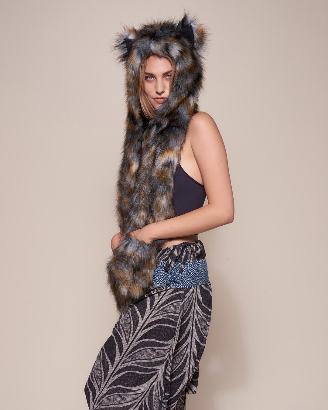 Woman wearing Brindle Wolf Collector Edition Faux Fur Hood, side view 2