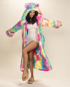 Playful smiling girl, arms outstretched, one knee bent in open Rainbow Bear Faux Fur Robe with hood and ears up. Fun, cozy style, 