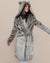 Girl with whimsical look, arms swaying, in Classic Women’s Long Silver Leopard Faux Fur Coat with hood and ears up, belt secured.