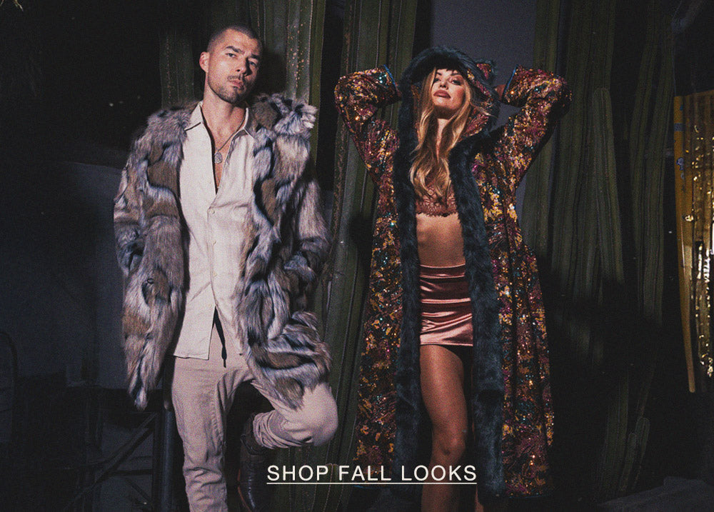 Man wearing a faux fur coat standing next to a woman wearing a sequin robe with SHOP FALL LOOKS linked 