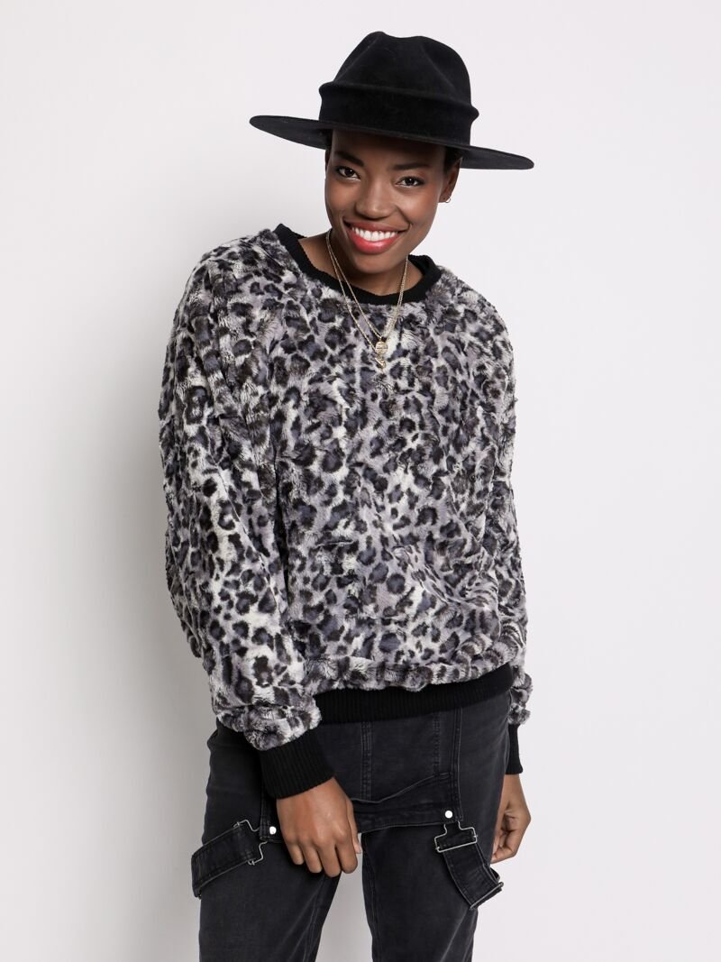 Woman wearing Bobcat Luxe Sweater, front view 2