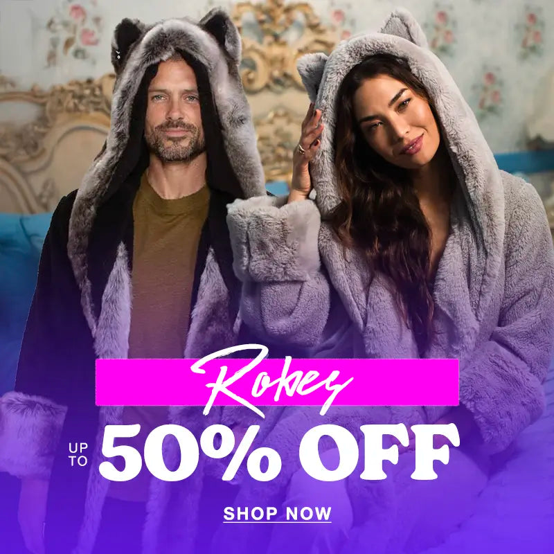 Man and woman wearing faux fur robes  with text that says Robes up to 50% Off Shop Now