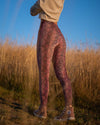 Back View of Pink Python High-Waisted Velvet Leggings on Woman