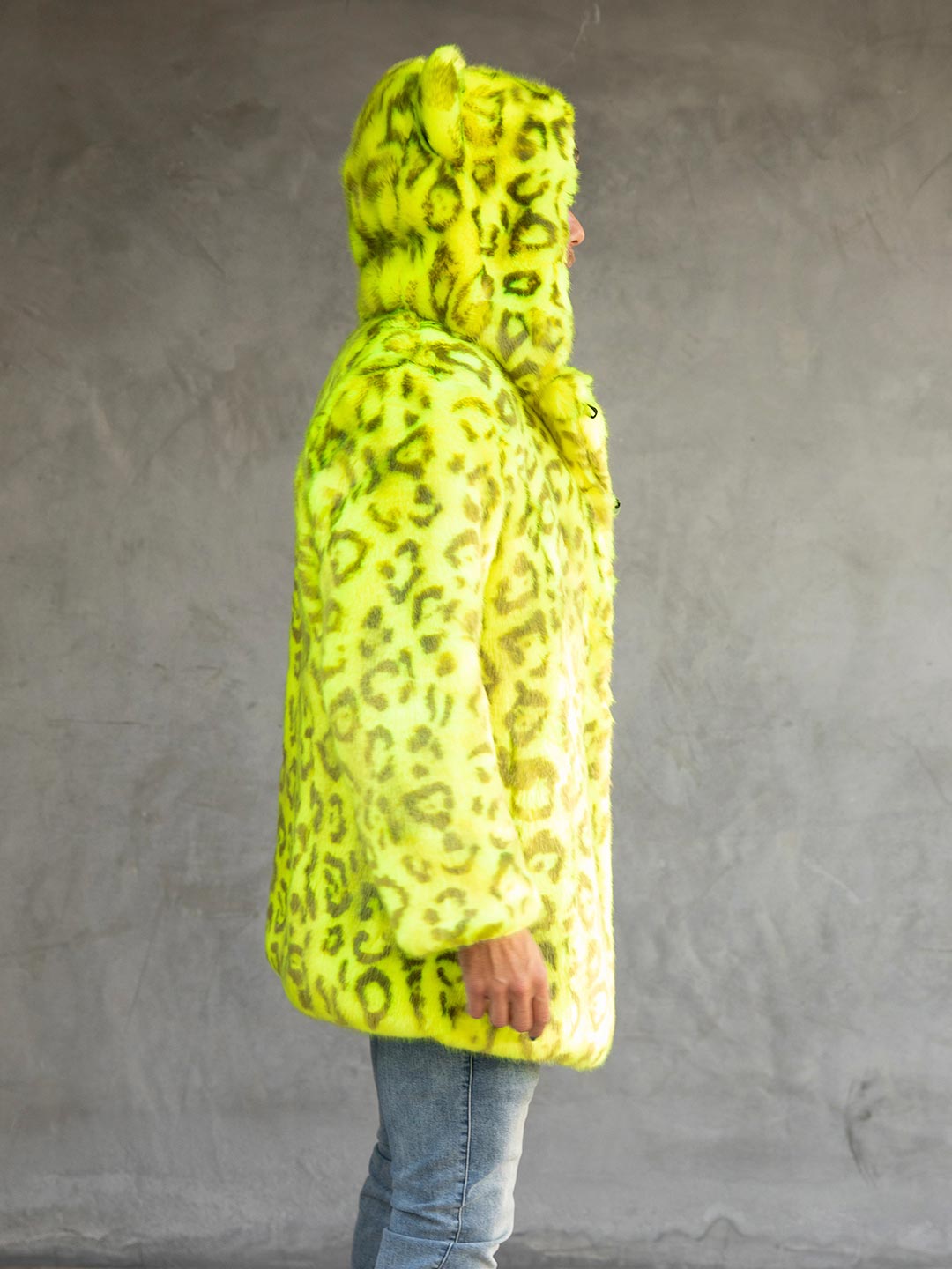 Man wearing Neon Yellow Leopard Luxe Classic Faux Fur Coat, side view 1