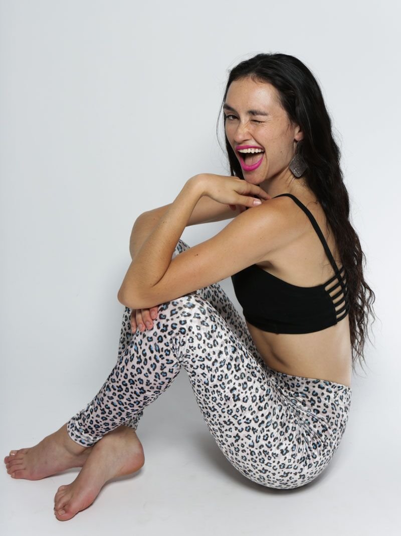 Woman wearing Spotted Blue Leopard Velvet Leggings, side view 2