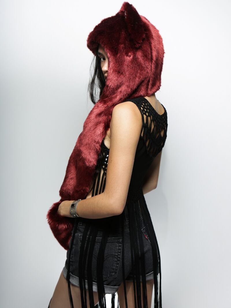 Woman wearing faux fur Collector Edition Fire Wolf SpiritHoods, side view 1