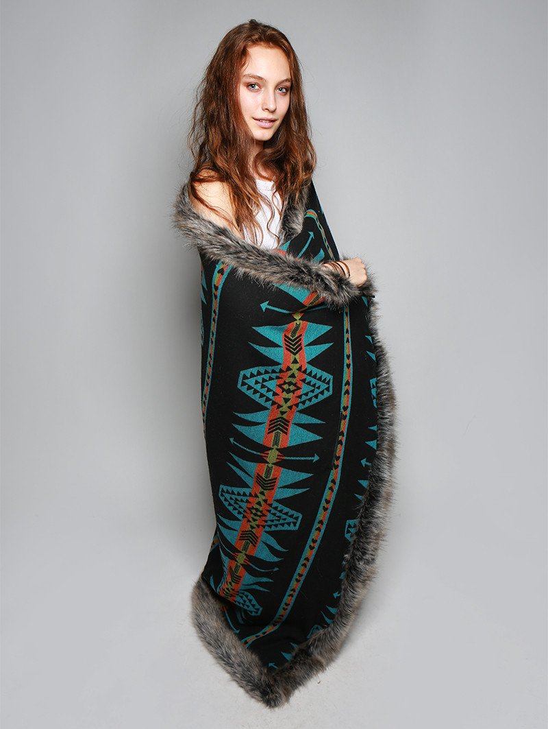 Woman wearing faux fur Grey Wolf Reverse Throw