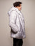 Man wearing Limited Edition Husky Faux Fur Coat, side view 1