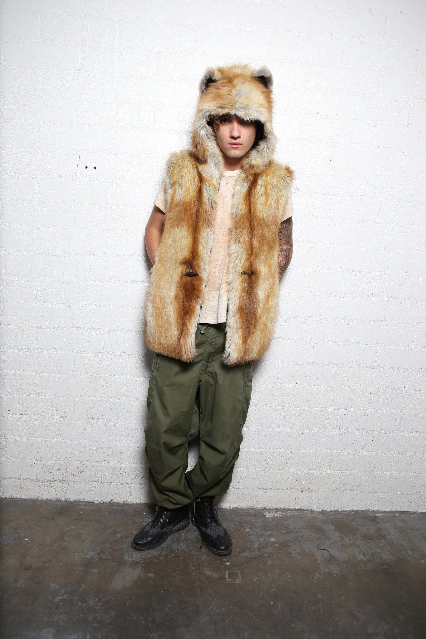 Man wearing faux fur Red Fox Vest, front view 1