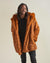 Man wearing Artist Edition VAMP Wolf Faux Fur Coat, front view 1