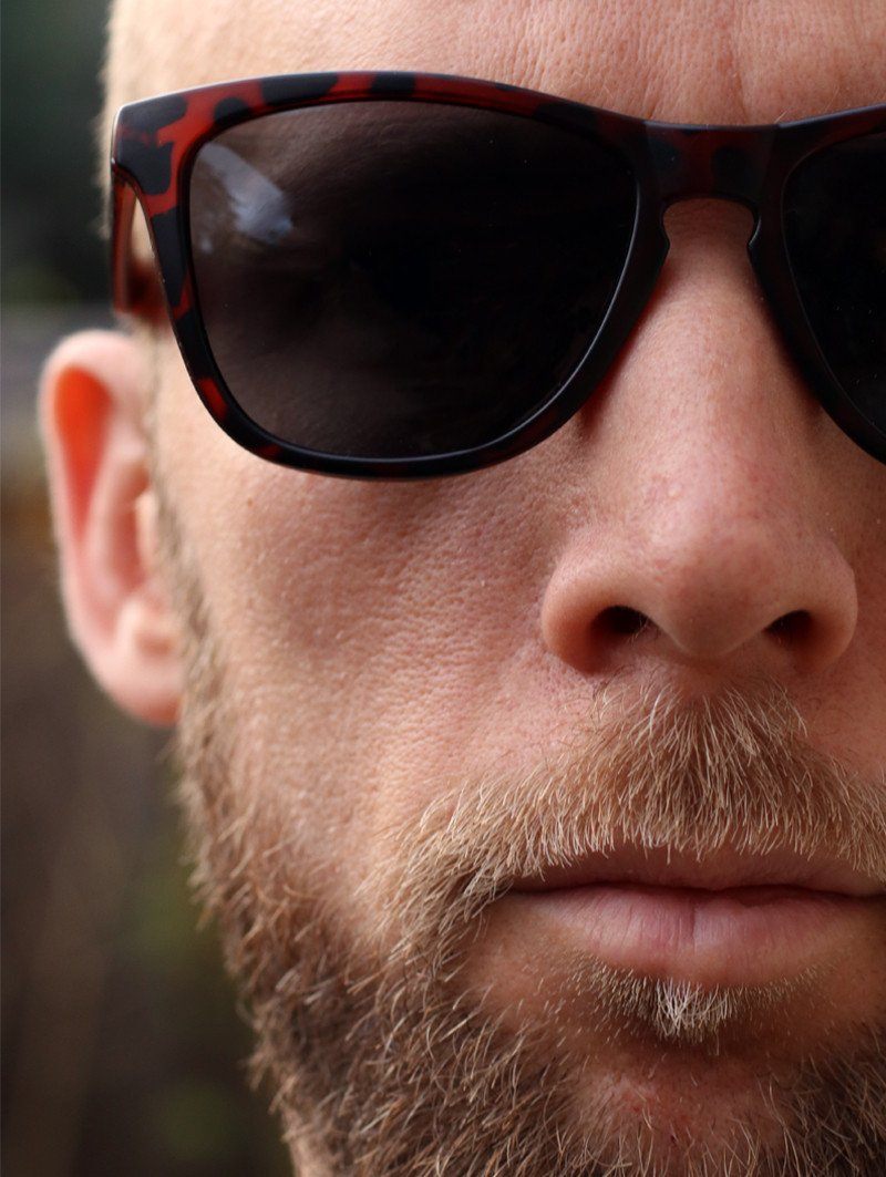 Male Model Wearing Unisex Tortoise Shell Sunglasses 