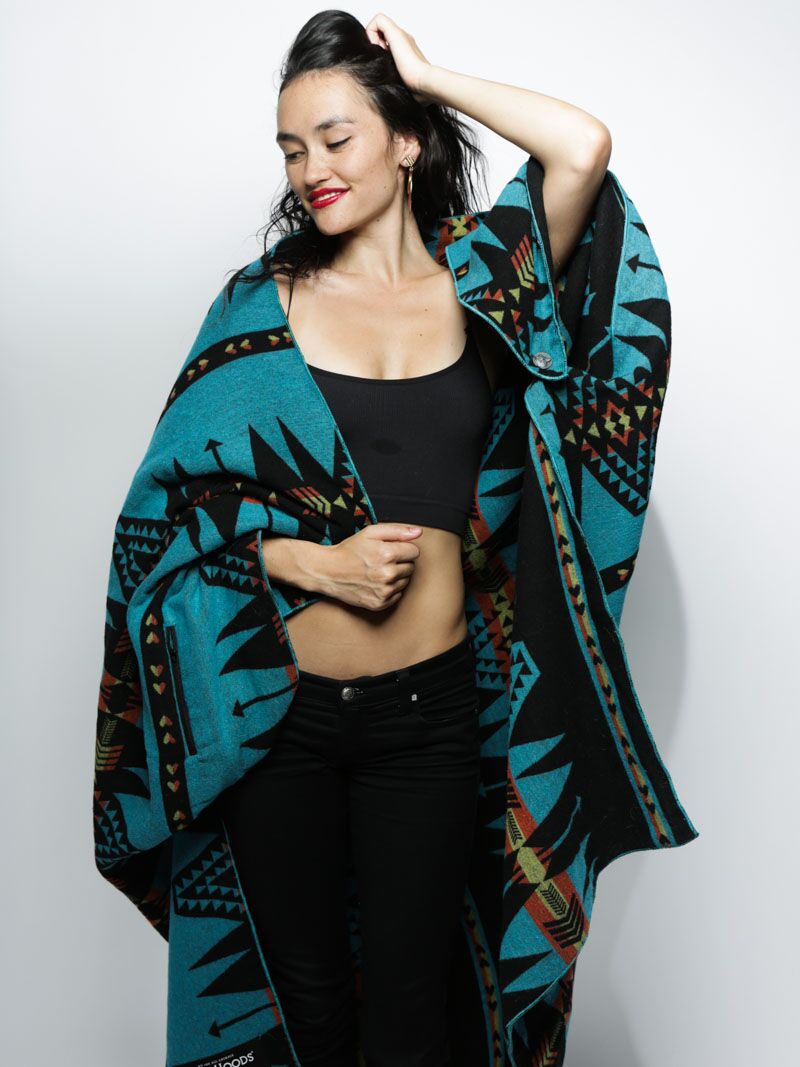 Female Wrapped in Turquoise Adventure Fabric Throw 